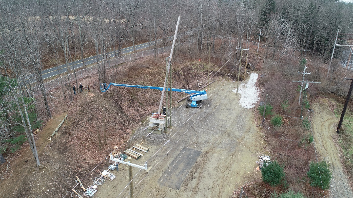 The full-scale overhead structure test facility exposes lines to midspan tree strikes to investigate structural failure modes and identify opportunities to improve structure resiliency